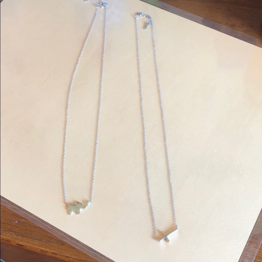 Sterling silver elephant and cross necklace